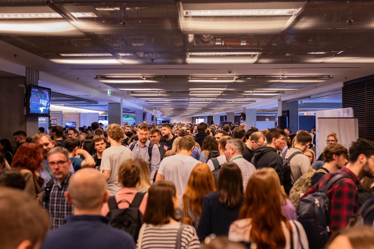 WDI participant listening to a speech